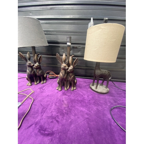 91 - Three animal inspired lamps including two hare and one girraffe.