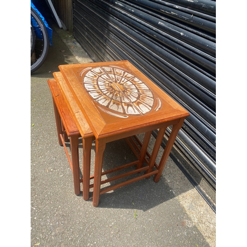 245 - Mid century teak tiled top nest of tables.