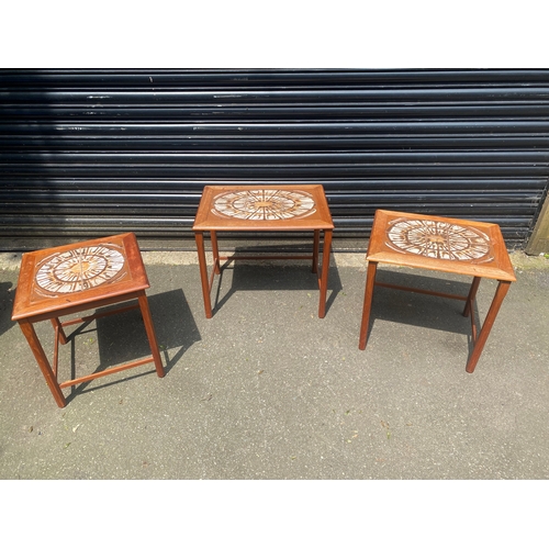 245 - Mid century teak tiled top nest of tables.