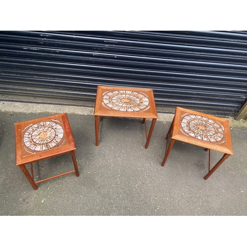 245 - Mid century teak tiled top nest of tables.