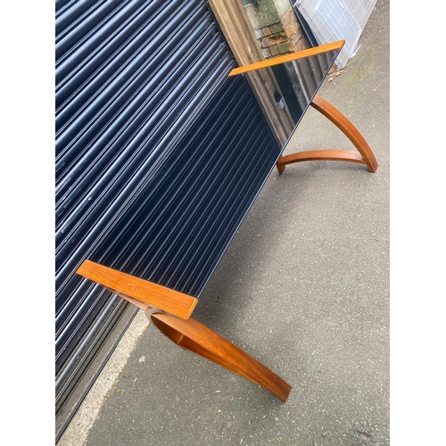 247 - Lovely teak and smoked black glass table.