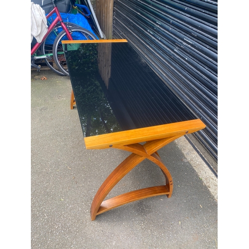 247 - Lovely teak and smoked black glass table.