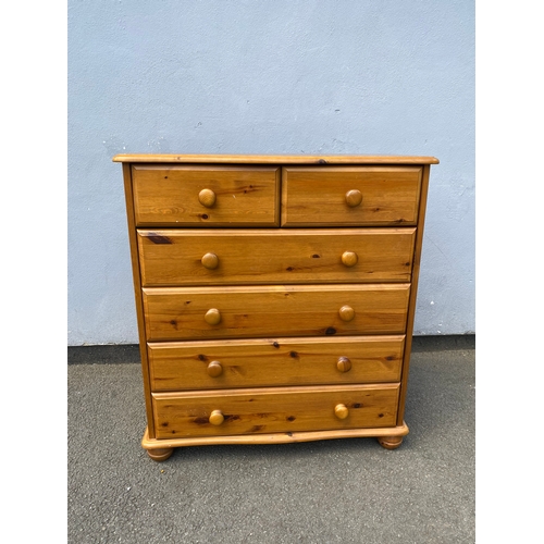 260 - Pine two over four chest of drawers and a matching three drawer bedside table