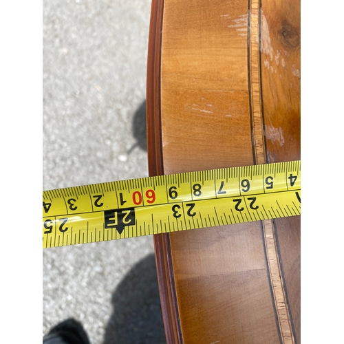 264 - Small oval inlaid tilt top coffee table.