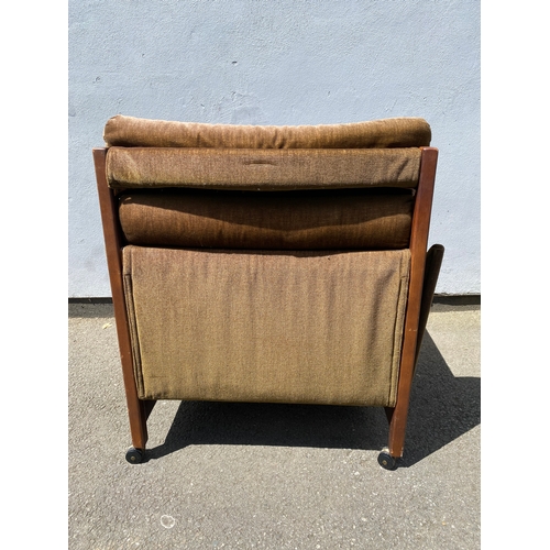 266 - Retro green upholstered armchair.