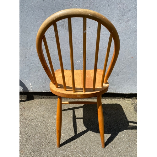 271 - A Mid century blonde Ercol chair and Antique ballon back mahogany upholstered chair.