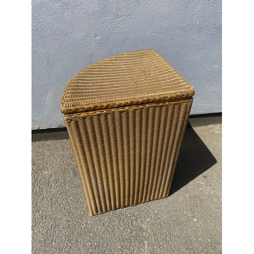 272 - Lloyd loom laundry basket and a three tier wicker corner shelving unit.