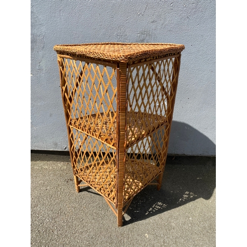 272 - Lloyd loom laundry basket and a three tier wicker corner shelving unit.