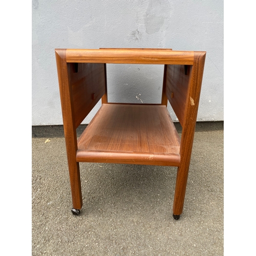 281 - Mid century drop leaf table on wheels.