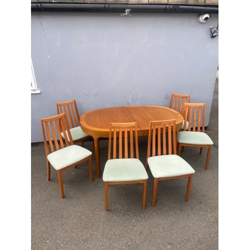 286 - A beautiful mid century teak Nathan extendable dining table and six G Plan chairs.