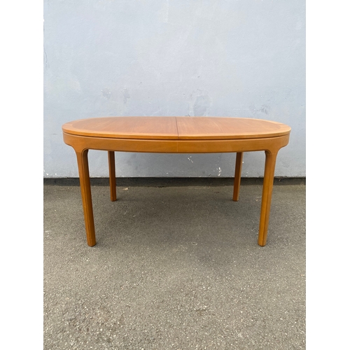 286 - A beautiful mid century teak Nathan extendable dining table and six G Plan chairs.