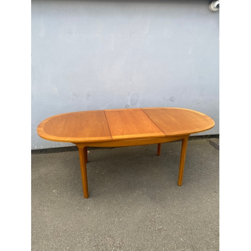 286 - A beautiful mid century teak Nathan extendable dining table and six G Plan chairs.