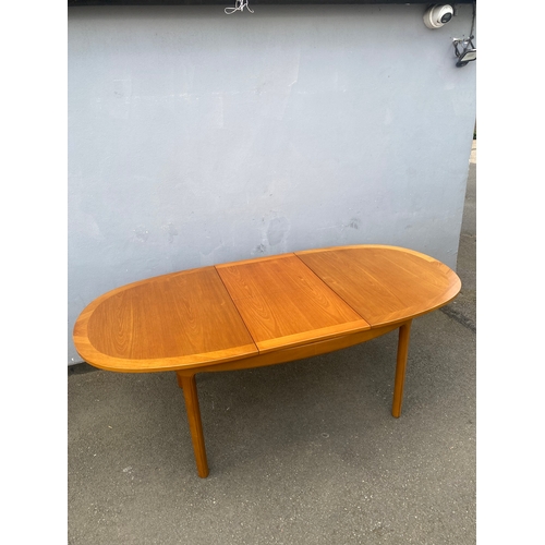 286 - A beautiful mid century teak Nathan extendable dining table and six G Plan chairs.