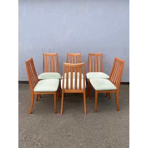 286 - A beautiful mid century teak Nathan extendable dining table and six G Plan chairs.