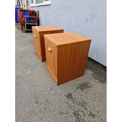 293 - A pair of mid century teak bedside tables