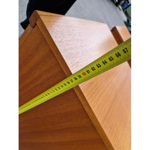 293 - A pair of mid century teak bedside tables