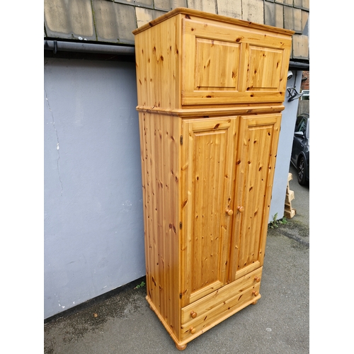 299 - Large Bellamy Ducal Pine double wardrobe and over head storage compartment