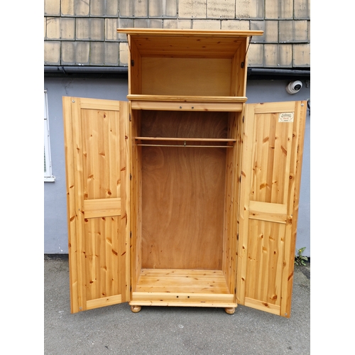 300 - Large Bellamy Ducal Pine double wardrobe and over head storage compartment