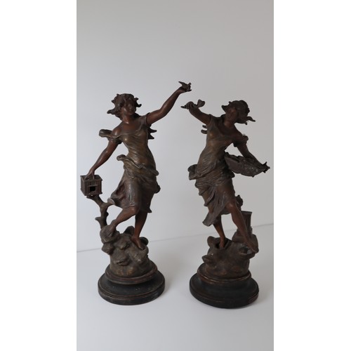 27 - Early 20th Century Pair of spelt metal souvenir figurines - 42cm