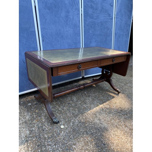 311 - 20th century mahogany and leather top coffee table with drop leaf extenders