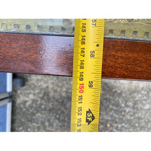 311 - 20th century mahogany and leather top coffee table with drop leaf extenders