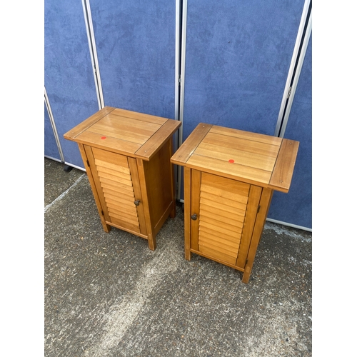 334 - A pair of pine bedside tables.