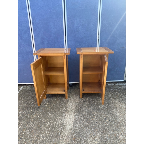 334 - A pair of pine bedside tables.