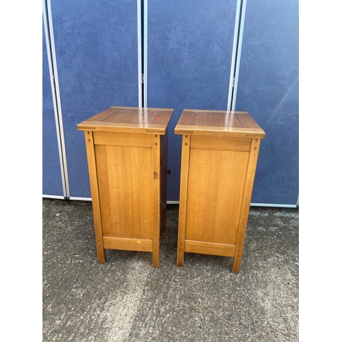 334 - A pair of pine bedside tables.