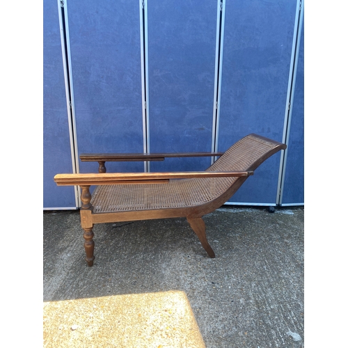 341 - EARLY 20TH CENTURY TEAK COLONIAL PLANTERS CHAIR WITH RATTAN WEAVE