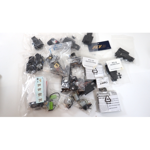 18 - New in bags Slot Car Racing Model Motors , under carriages & accessories