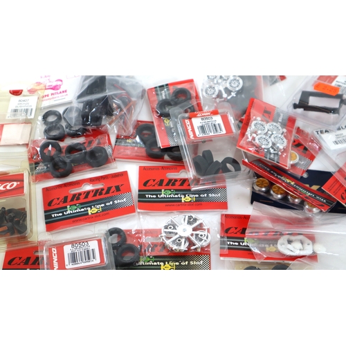 19 - Collection of new in bag Cartrix, Ninco Slot Car Model Racing accessories, wheels, tyres etc