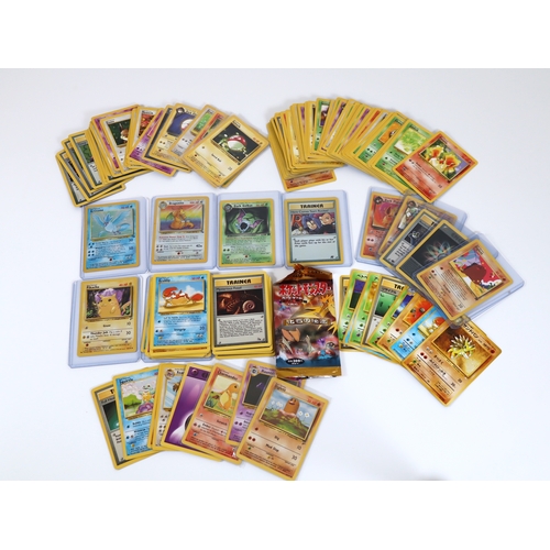 202 - Pokemon TCG - A group of 4 holographic cards from Fossil and Team Rocket Sets Articuno, Dragonite, D... 