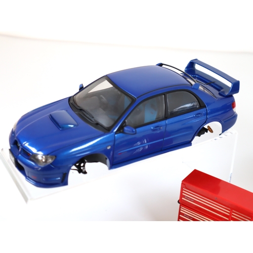 67 - 1:18 Scale Subaru Impreza + Mitsubishi Evo + Snap On branded Garage / Mechanics  accessories / Tools