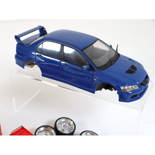 67 - 1:18 Scale Subaru Impreza + Mitsubishi Evo + Snap On branded Garage / Mechanics  accessories / Tools