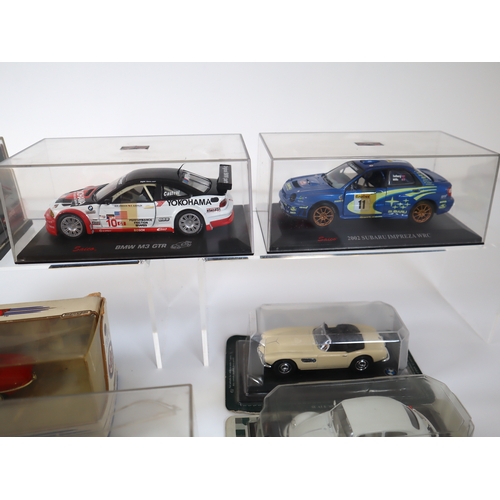 81 - Collection of cased die-cast models Corgi, Saico, Dinky, Cararama, Schuco + others Land Rovers, Clas... 