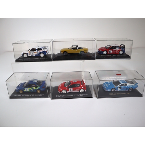 85 - Cased 1:32 Scale Die-cast Rally Model Cars Ford Escort Coswroth, Subaru Impreza WRC, Peugeot 206 WRC... 