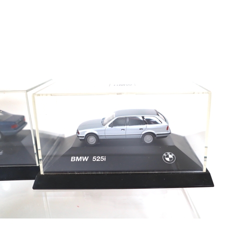 106 - Collection of 1:64 Scale cased model cars including Subaru Impreza WRC, Lancer Evolution WRC, BMW's ... 