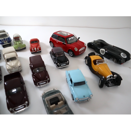 212 - A collection of die-cast model Morris Minors + others