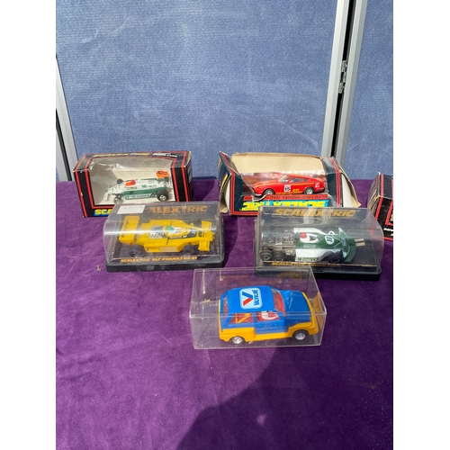 223 - Boxed scalextrics cars and one boxed model car