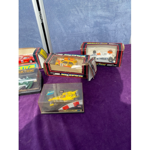 223 - Boxed scalextrics cars and one boxed model car