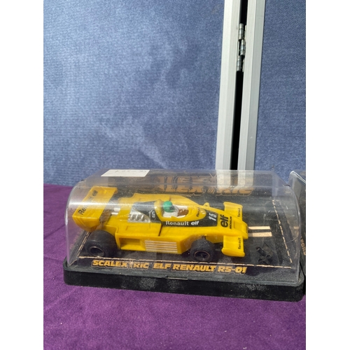 223 - Boxed scalextrics cars and one boxed model car