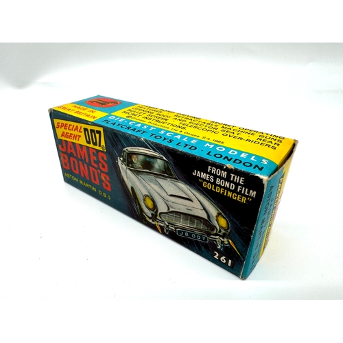 250 - Corgi Toys - 261 James Bond Aston Martin in box