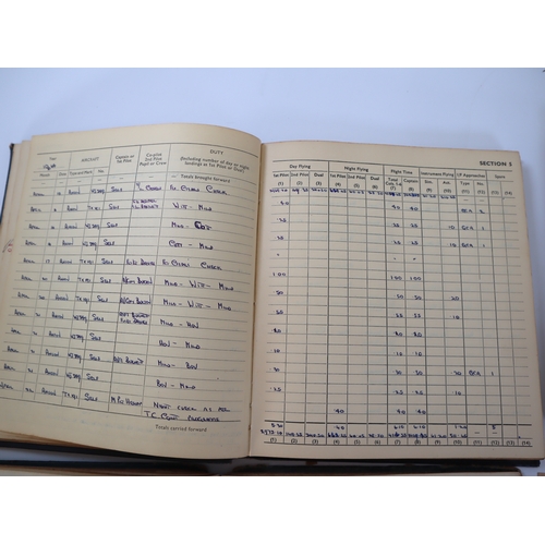 75 - WW2 to 1950's RAF and Royal Canadian Air Force Pilots Flying Log books including original photograph... 