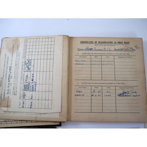 75 - WW2 to 1950's RAF and Royal Canadian Air Force Pilots Flying Log books including original photograph... 