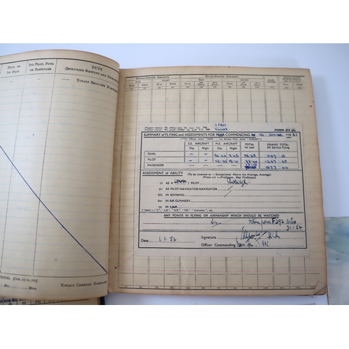 75 - WW2 to 1950's RAF and Royal Canadian Air Force Pilots Flying Log books including original photograph... 