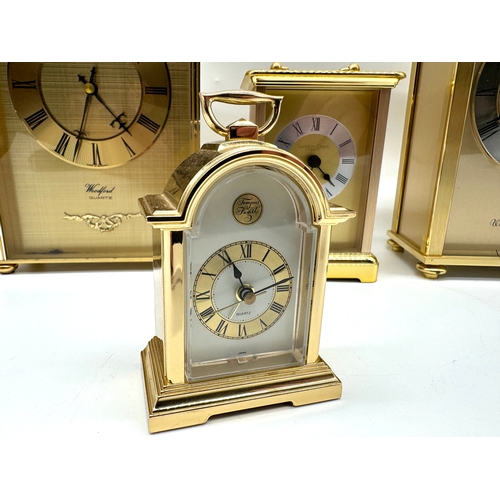 102 - Four Brass Quartz Mantle Clocks