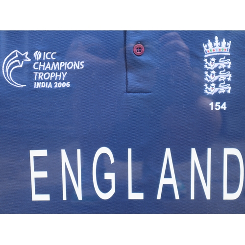 165 - Cricket - Framed England ICC Champions Trophy India 2006 Jersey signed by ANDREW 'FREDDIE' FLINTOFF ... 