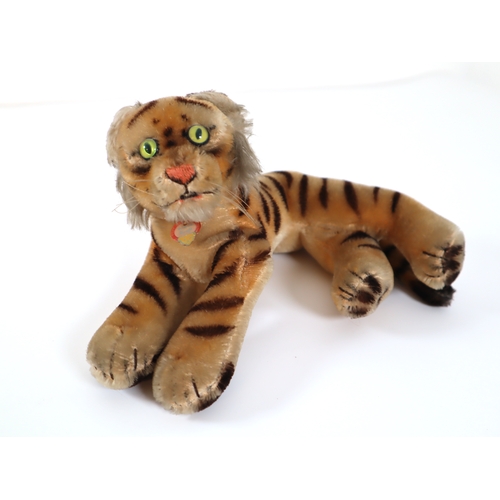 108 - Vintage 1950's Mohair Steiff Tiger laying down - 22cm with original paper tag