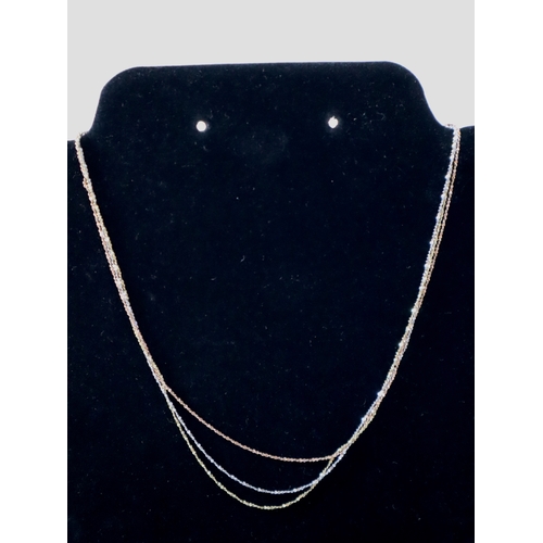 121 - 750 / 18ct Three tone gold necklace 4.4g