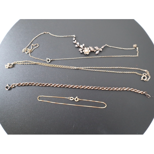 122 - 9ct yellow gold link bracelet & sterling silver chains